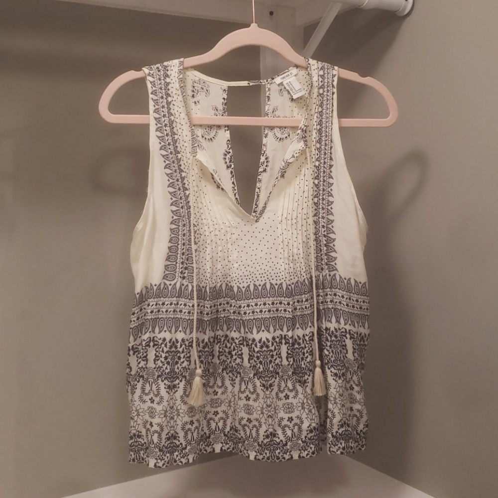 Cream and navy sleeveless top